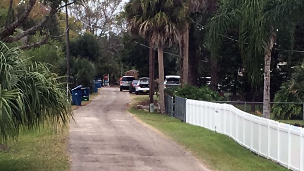 Deputies in Volusia County respond to a home on Beehive Drive on Friday afternoon after a report that a man who had gotten into an argument with his family threatened to detonate an explosive. (Joh Ficurilli/Spectrum News 13)