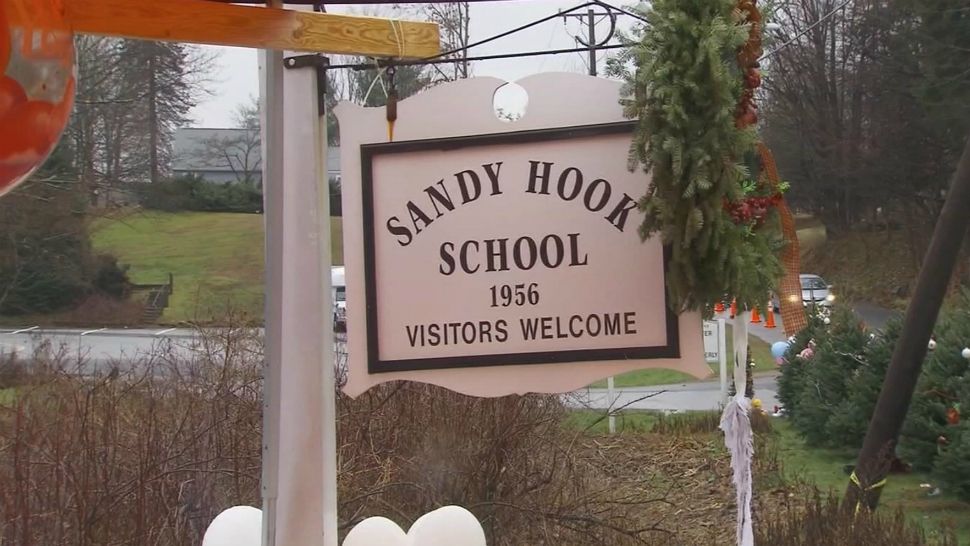 Students at Sandy Hook Elementary School in Newtown, Connecticut, were sent home after the school received a bomb threat Friday, the 6th anniversary of the massacre that left 26 people dead. (Screen capture from file video)