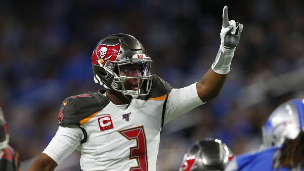Tampa Bay Buccaneers quarterback Jameis Winston signals during the first half of an NFL football game against the Detroit Lions, Sunday, Dec. 15, 2019, in Detroit. (AP Photo/Paul Sancya)