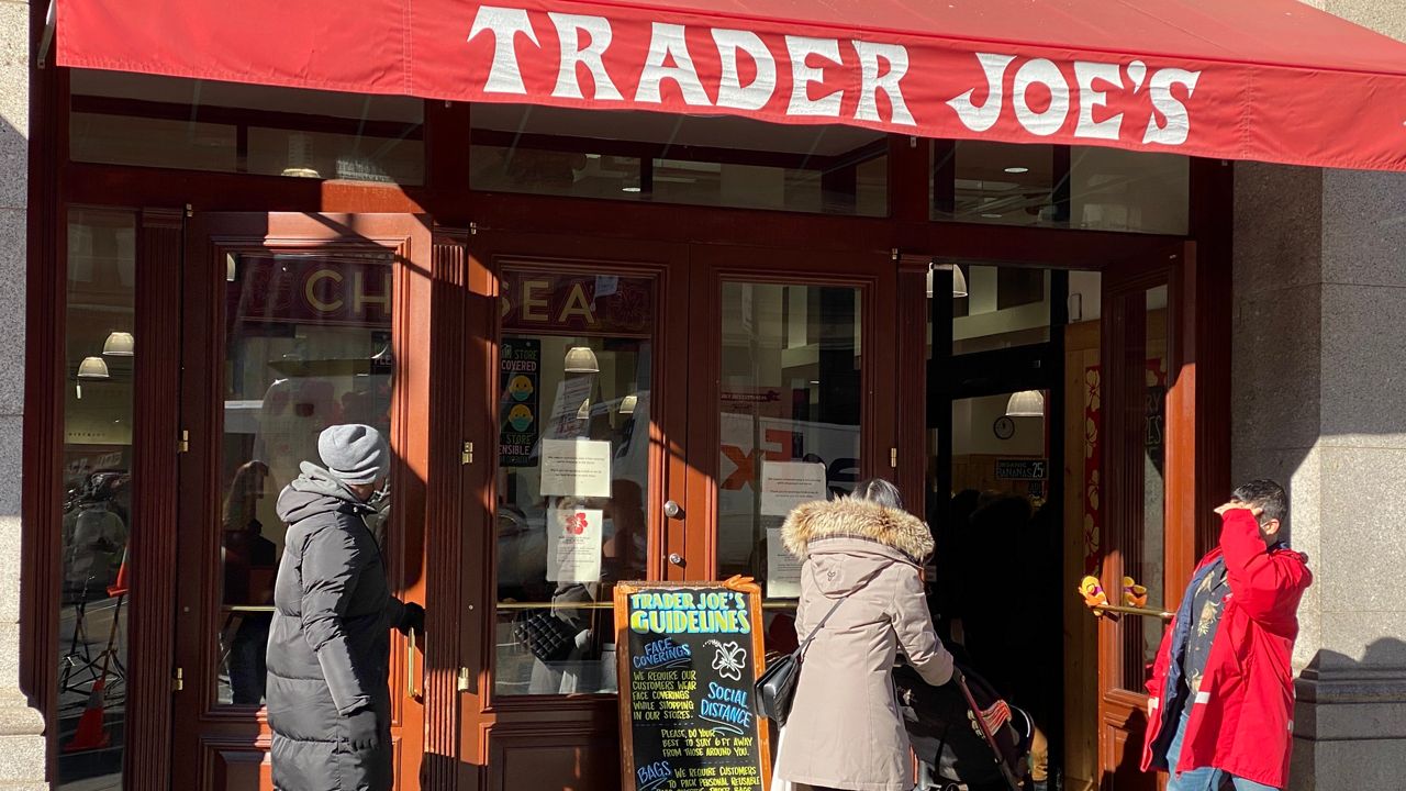 New Yorkers heading into the Trader Joe's in Chelsea on December 15, 2020, to stock up on groceries ahead of a snowstorm