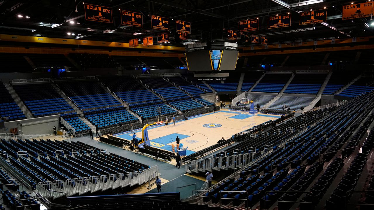 An empty Pauley Pavilion is seen before an NCAA college basketball game between UCLA and Alabama State Wednesday, Dec. 15, 2021, in Los Angeles. (AP Photo/Marcio Jose Sanchez)