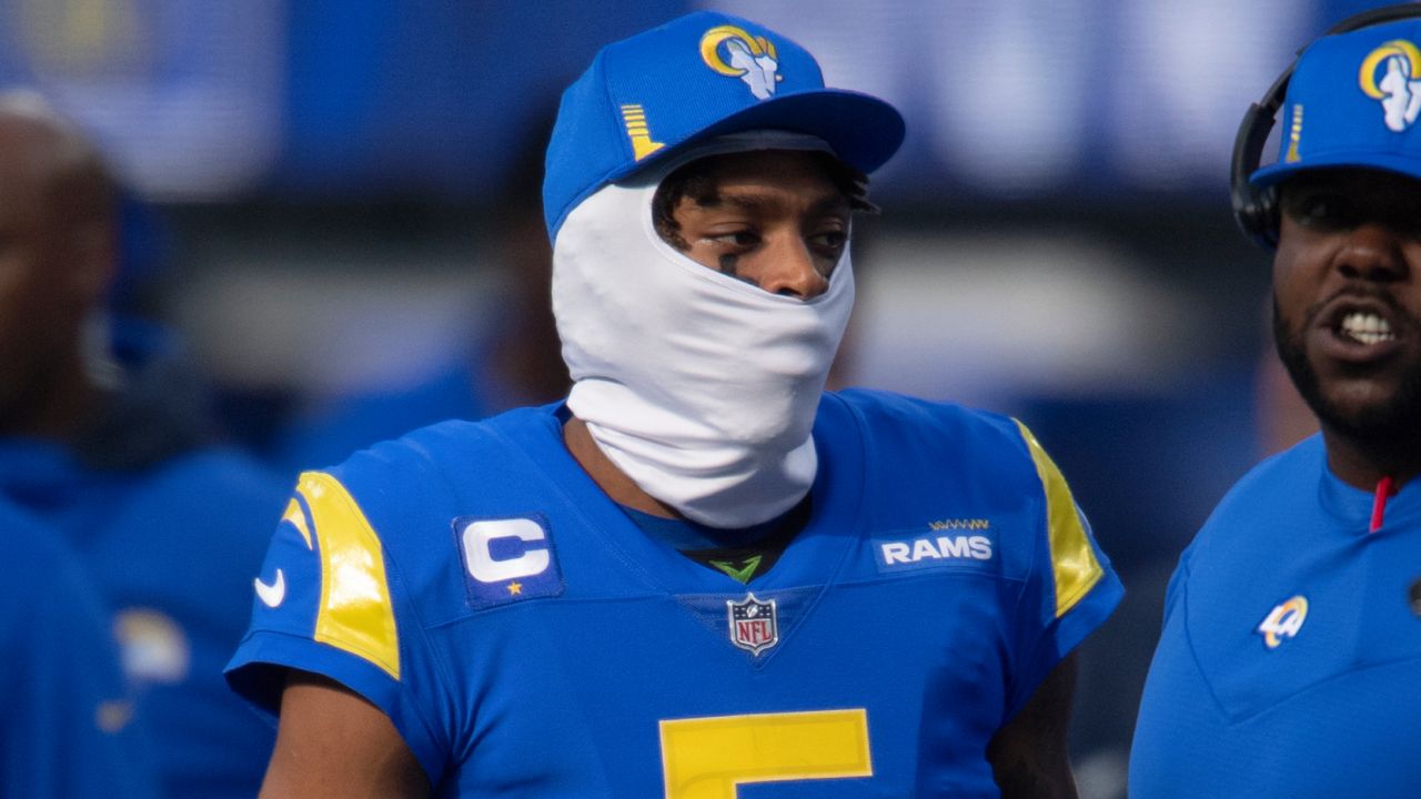 Los Angeles Rams cornerback Jalen Ramsey (5) on the sideline without his helmet wearing a mask while playing the Jacksonville Jaguars during an NFL Professional Football Game Sunday, Dec. 5, 2021, in Inglewood, Calif. (AP Photo/John McCoy)