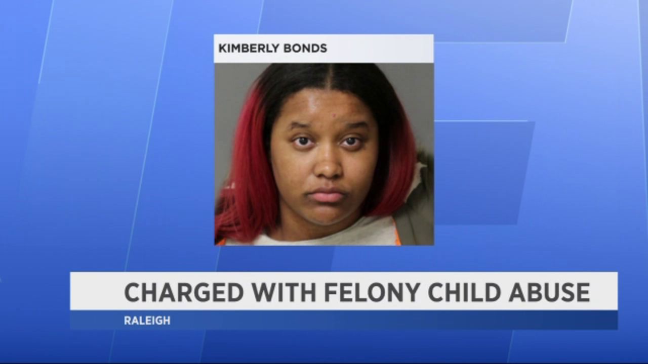 Woman charged with felony child abuse after putting heating pad in diaper