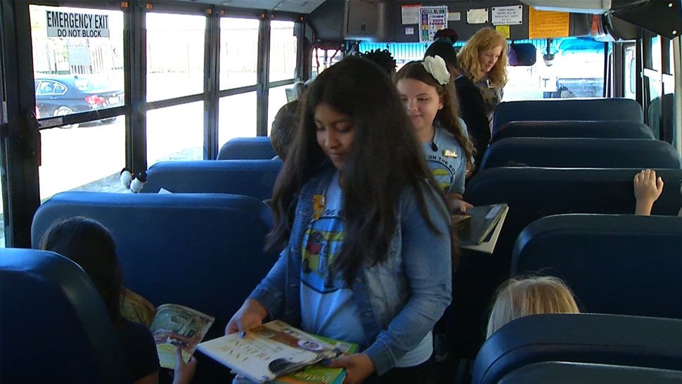 Reading advocate April Taylor recently started the program called "Books on the Bus." (Rick Elmhorst/Spectrum Bay News 9)