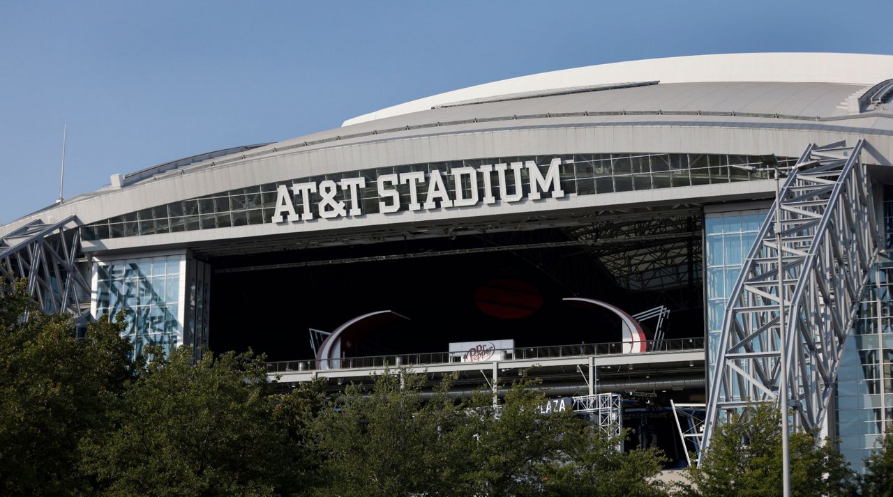 The outside of AT&T Stadium is shown with the end zone doors open before an NFL football game between the Dallas Cowboys and the Cleveland Browns in Arlington, Texas, Sunday, Oct. 4, 2020. (AP Photo/Ron Jenkins)