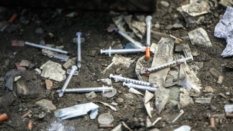 Used needles litter the ground. (Michael Bryant /The Philadelphia Inquirer via AP, File)