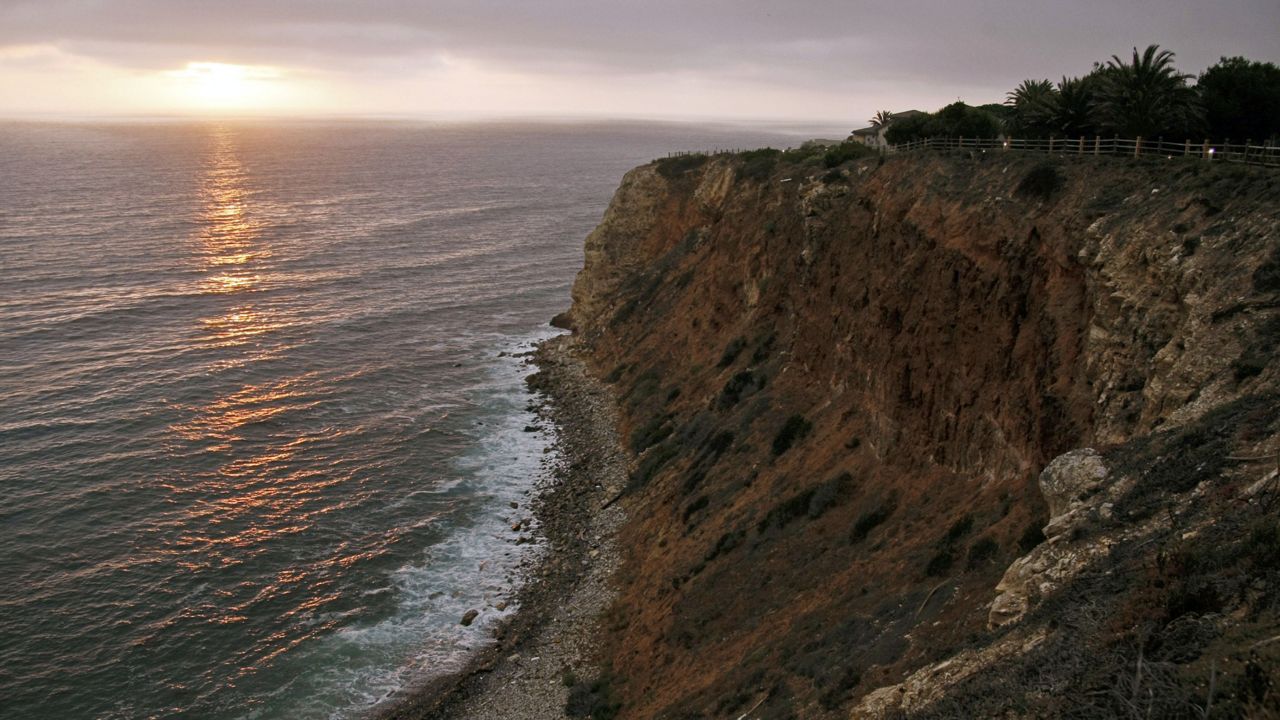 The sun sets at the Point Vicente Park on the Pacific Ocean in Palos Verdes, Calif. (AP Photo/Damian Dovarganes)
