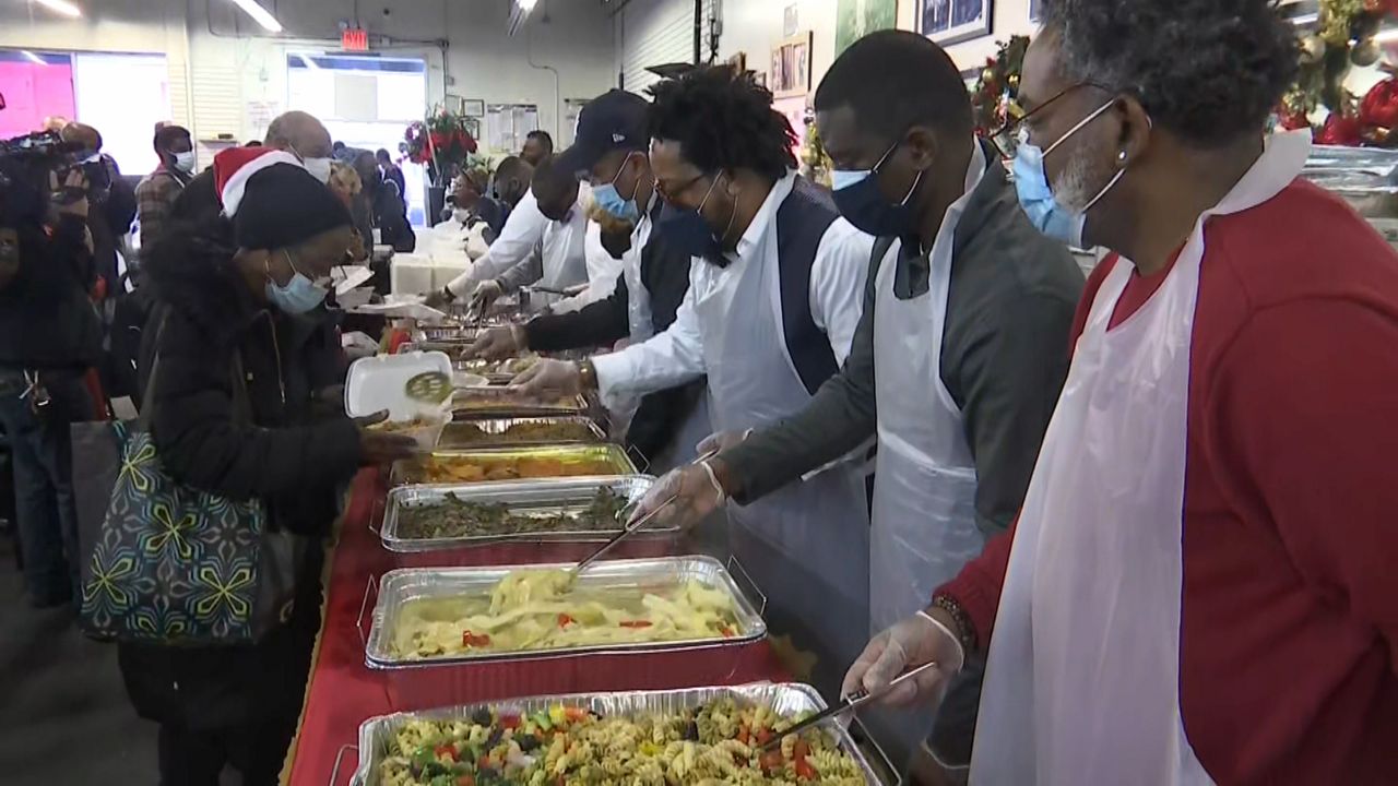 Harlem Neighbors Receive Food On Christmas Day