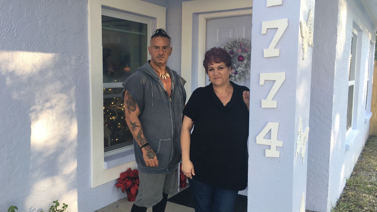 Joey and Sharon Licalzi bought the Lutz, Florida home where most of the movie "Edward Scissorhands" was filmed 30 years ago. Longtime fans, Sharon said she cried when she learned they would be the new owners. (Sarah Blazonis/Spectrum News)