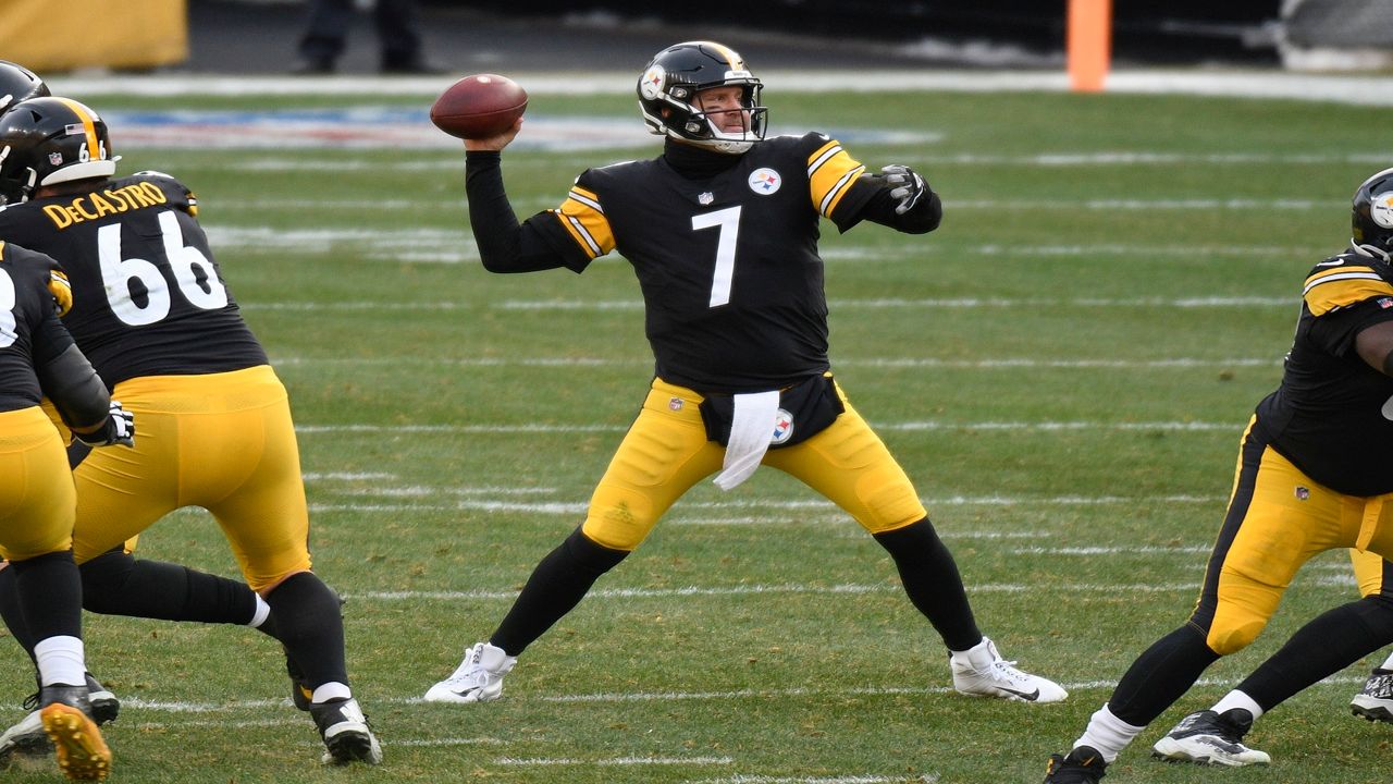 A quarterback throws the ball