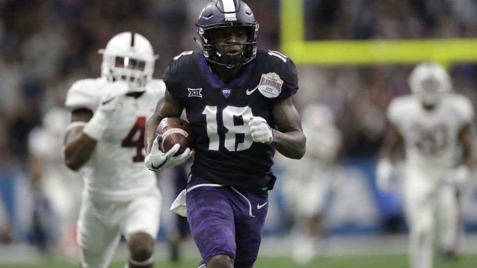 An image of Texas Christian University football playing in the Alamo Bowl (AP Image/File)