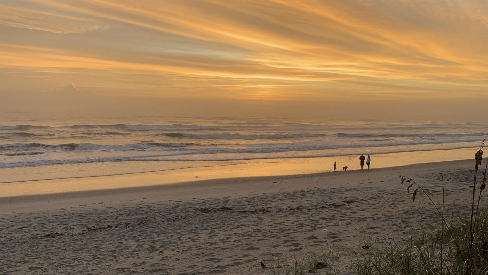 Sent to us with the Spectrum News 13 app: Bright orange sunrise over a warm Satellite Beach on Friday. (Ian Alfano/Viewer)