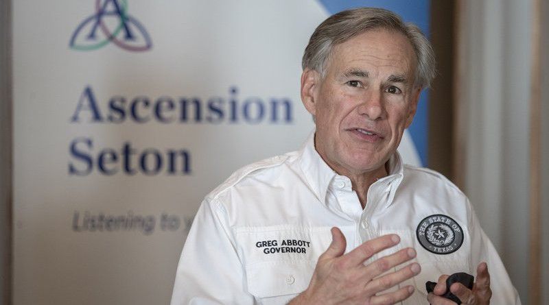 Texas Gov. Greg Abbott speaks to the local media before receiving a dose of a Pfizer-BioNtech COVID-19 vaccine at the Ascension Seton Medical Center on Tuesday, Dec. 22, 2020. (Ricardo B. Brazziell /Austin American-Statesman via AP)