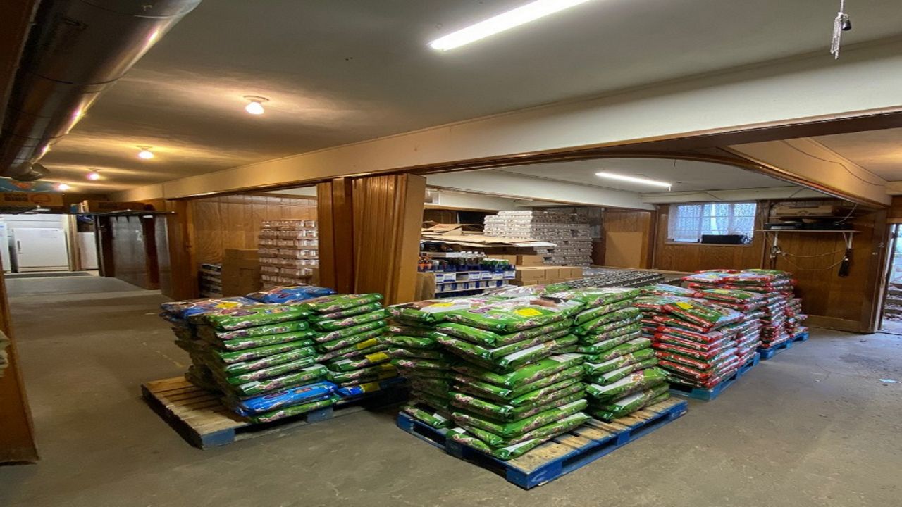 Pallets of pet food in a warehouse
