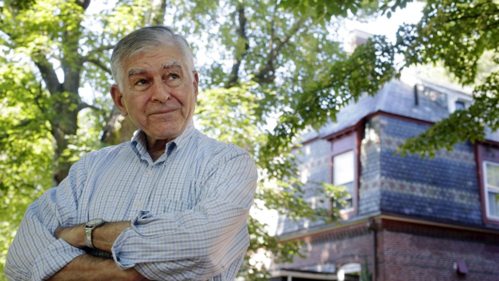In this Thursday, Aug. 2, 2018 photo former Massachusetts governor and onetime Democratic presidential candidate Michael Dukakis stands for a photograph at his home, in Brookline, Mass. (AP Photo/Steven Senne)