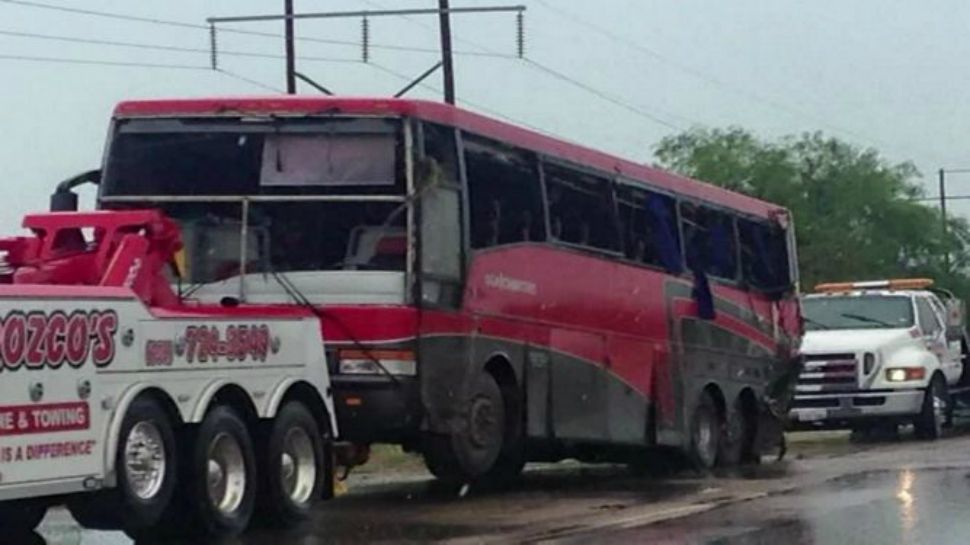 The bus involved in the crash in 2015 is towed away (Spectrum News file footage)