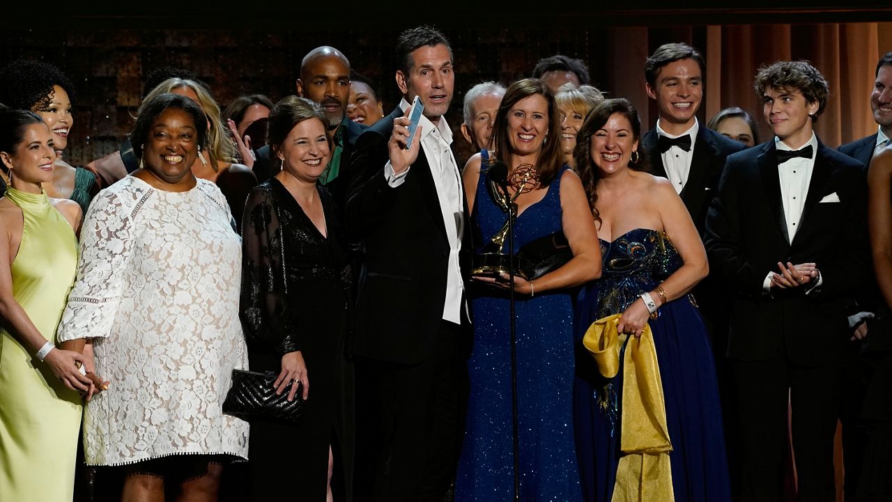 The cast and crew of "General Hospital" accept the award for outstanding daytime drama series at the 49th annual Daytime Emmy Awards on Friday, June 24, 2022, in Pasadena, Calif. (AP Photo/Chris Pizzello)