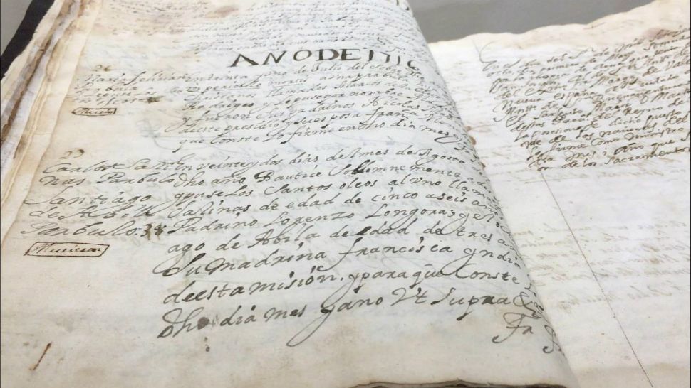 The 1703 Baptismal Book appears in this image from Sept. 18, 2018. (Lauren Due/Spectrum News)