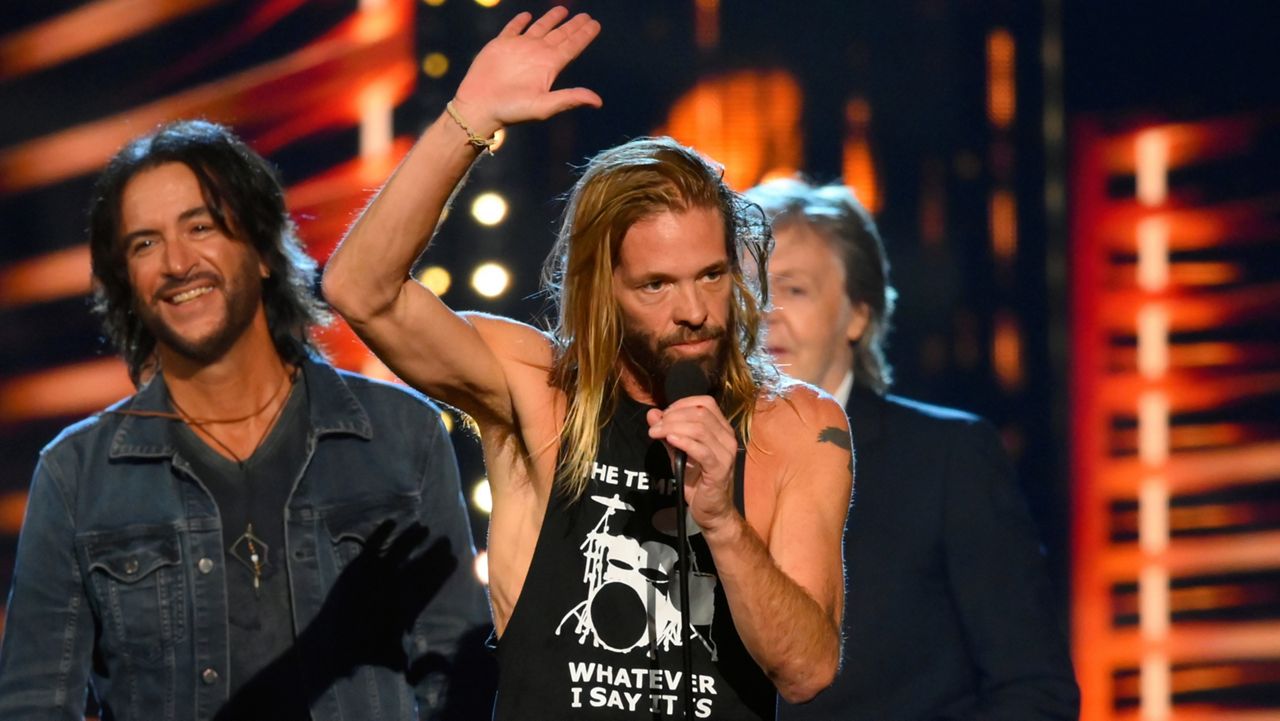 Drummer Taylor Hawkins of the Taylor Hawkins of the Foo Fighters speaks during the Rock & Roll Hall of Fame induction ceremony, Sunday, Oct. 31, 2021, in Cleveland. (AP Photo/David Richard
