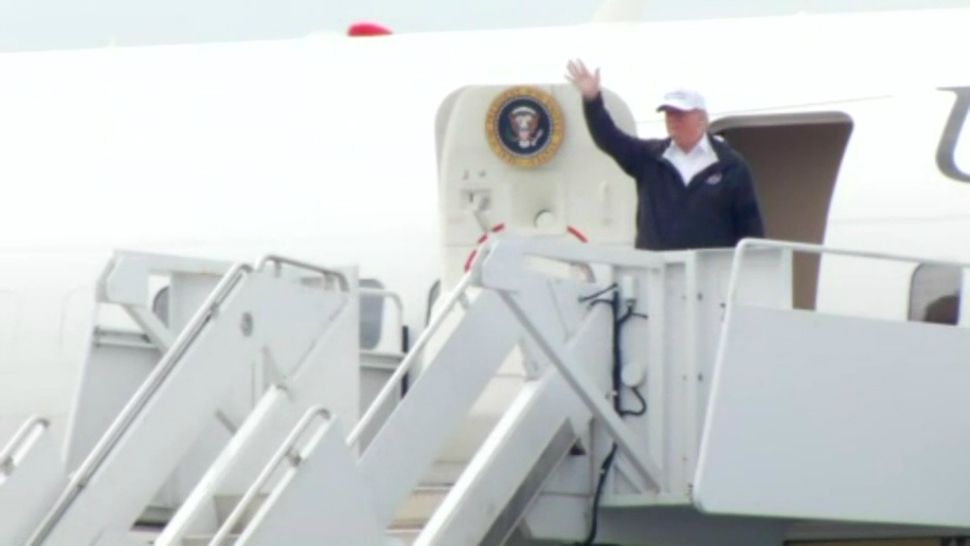 President Donald Trump waves after landing in McAllen, Texas (Spectrum News footage)
