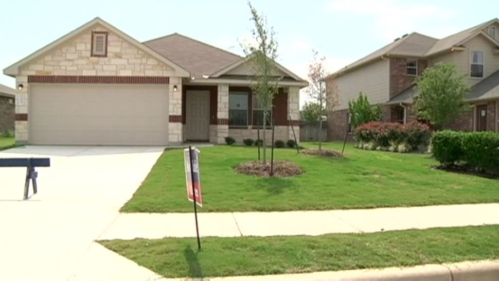 A file photograph of the front of a house. (Spectrum News images)