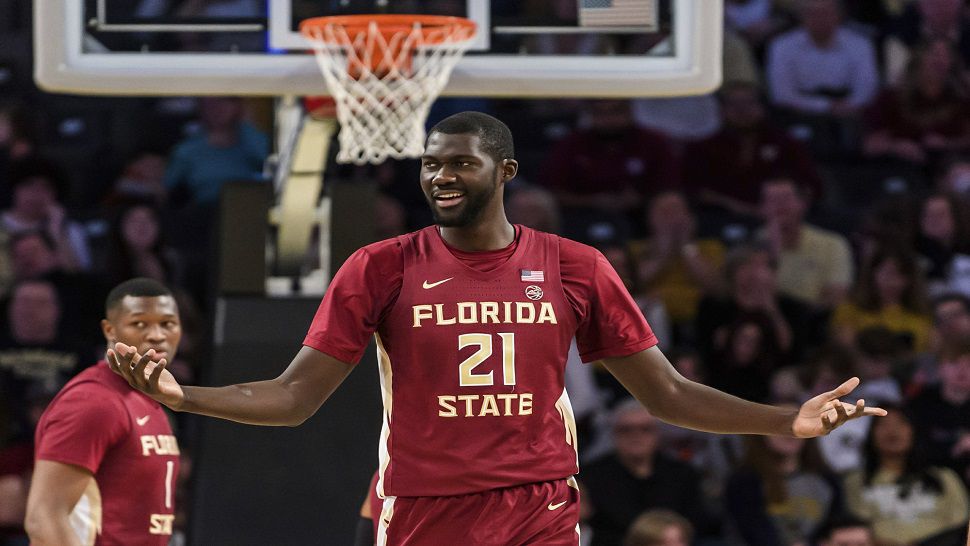 Florida State center Christ Koumadje reacts to a call during the first half of FSU's 69-47 win over Georgia Tech.  Koumadje recorded his second straight double-double in the victory.  (AP Photo/Danny Karnik)