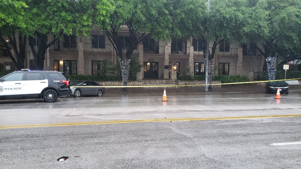 Water on the road has this section of South Congress Avenue blocked off by police. 