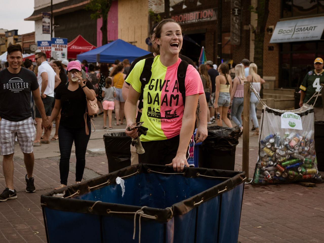 Marissa Michalkiewicz helps clean up the streets pf Green Bay