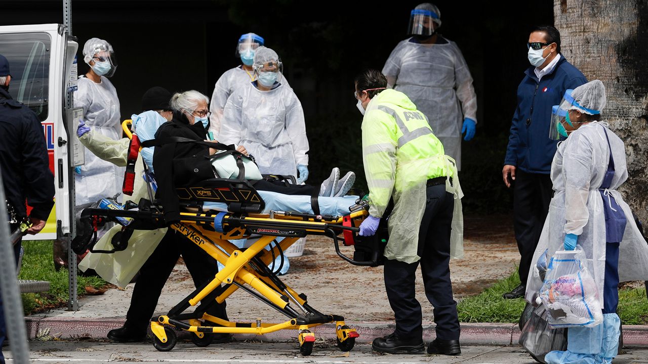 In this file photo, a patient was evacuated from the Magnolia Rehabilitation and Nursing Center in Riverside on April 8, 2020. More than 80 patients from a Riverside skilled nursing facility were being taken to other healthcare locations throughout Riverside County. (AP Photo/Chris Carlson)