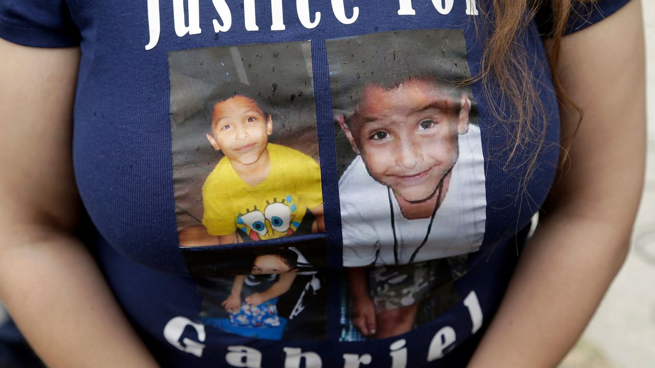 In this April 7, 2016, file photo, a friend of the family of Gabriel Fernandez, an 8-year-old boy who died in 2013, wears a shirt with his likeness in Los Angeles. A Southern California mother has been sentenced to life in prison and her boyfriend was sentenced to death in the killing of the 8-year-old boy who prosecutors say was punished because the couple believed he was gay. Los Angeles County Superior Court Judge George Lomeli sentenced the couple on Thursday, June 7, 2018, calling the 2013 death of 8-year-old Gabriel Fernandez "beyond animalistic." (AP Photo/Nick Ut, File)