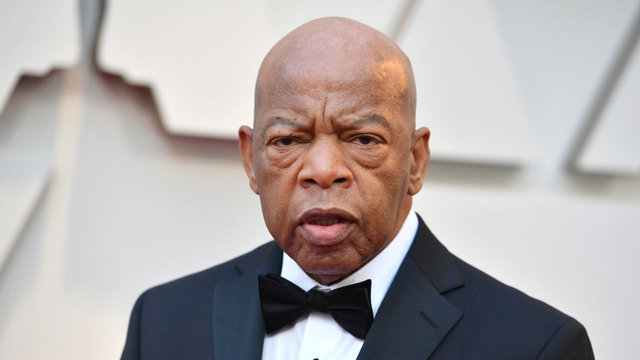 In this file photo from Feb. 24, 2019, Rep. John Lewis, D-Ga, arrives at the Oscars at the Dolby Theatre in Los Angeles. (Photo by Jordan Strauss/Invision/AP)
