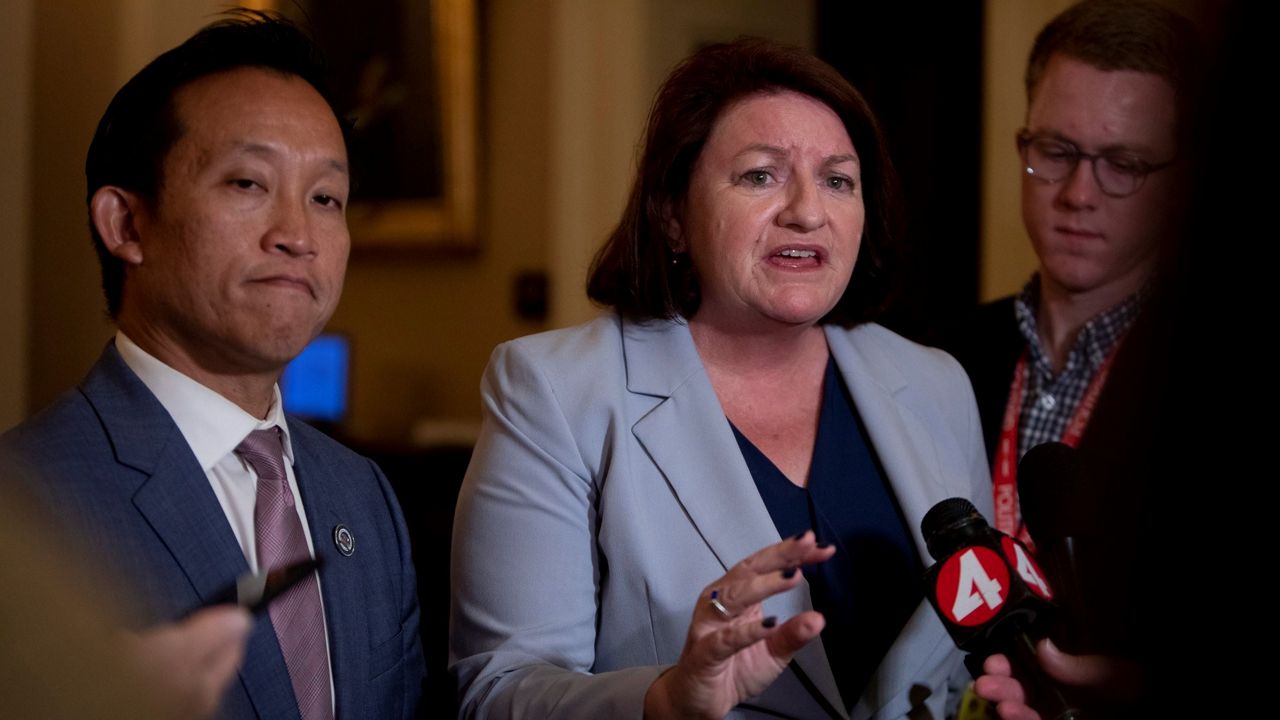 Assembly member Davis Chiu, left, Senate President pro Tempore Toni Atkins speak to the press following the passage of AB 1482 in the senate, a bill that would establish a statewide rent cap, on September 10, 2019. Photo by Anne Wernikoff for CalMatters
