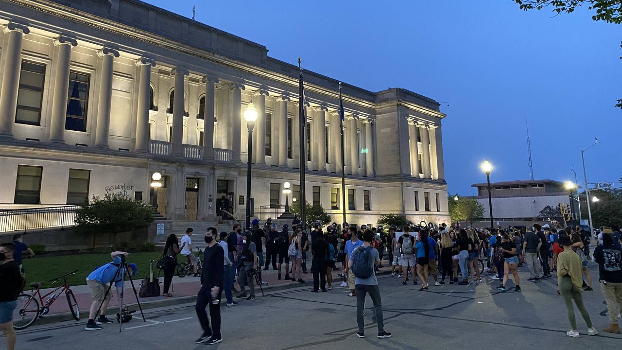 Protesters gather outside the Kenosha County courthouse Monday, Aug. 24, 2020. (Spectrum News/Sabra Ayres)