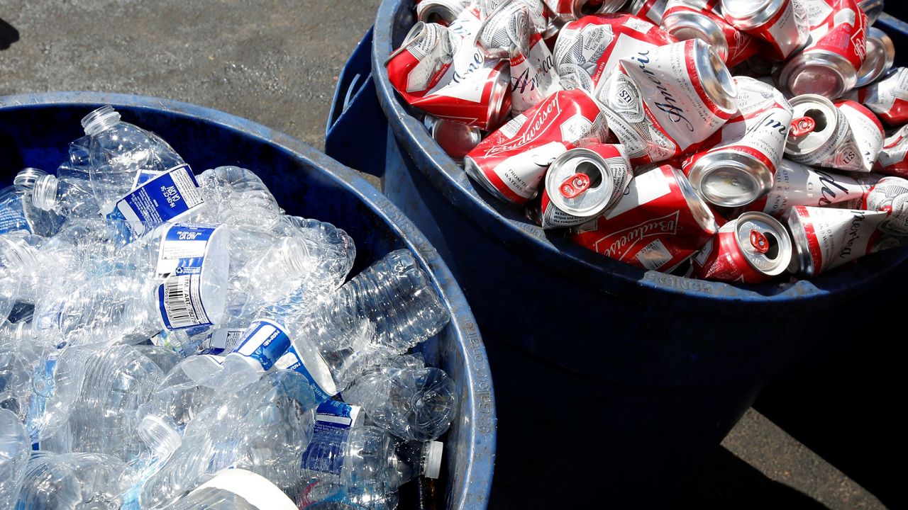 In this file photo from July 5, 2016, cans and plastic bottles brought in for recycling are seen at a recycling center in Sacramento. (AP Photo/Rich Pedroncelli)