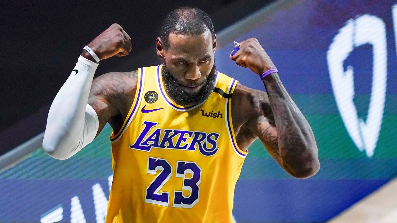 Los Angeles Lakers' LeBron James (23) reacts to a play against the Portland Trail Blazers during the first half of an NBA basketball first-round playoff game Saturday in Lake Buena Vista, Fla. (AP Photo/Ashley Landis)
