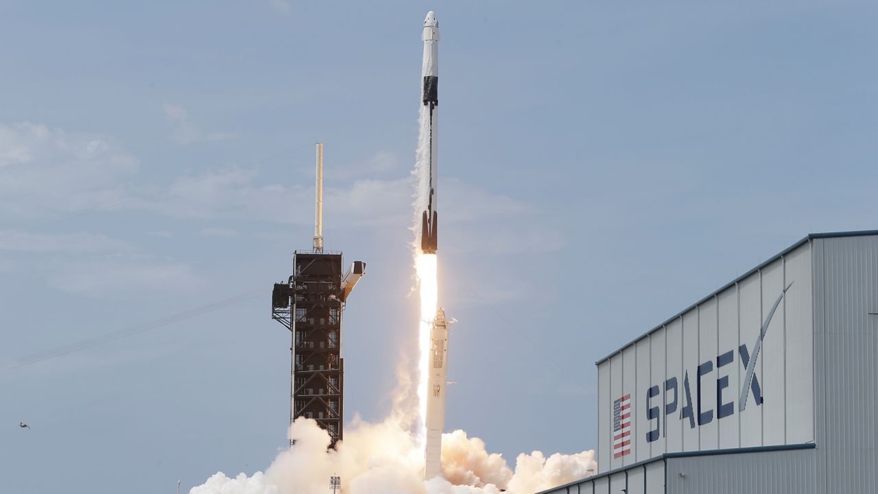 In this file photo from May 30, 2020, a SpaceX Falcon 9 lifts off from Pad 39-A at the Kennedy Space Center in Cape Canaveral, Florida. (AP Photo/John Raoux)