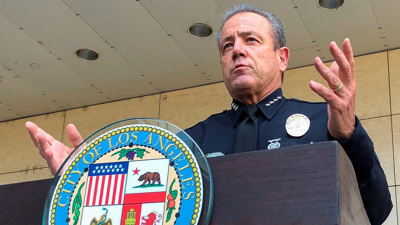 L.A. Police Chief Michel Moore speaks during a news conference outside LAPD headquarters on Aug. 26, 2020. L.A. crossed a grim threshold Sunday, Nov. 22, 2020, as the city unofficially recorded its 300th homicide for the year, a milestone last reached a decade ago. (AP Photo/Stefanie Dazio, File)