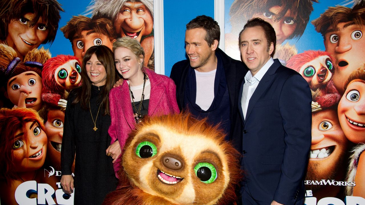 In this file photo from March 10, 2013, Catherine Keener, from left, Emma Stone, Ryan Reynolds, and Nicolas Cage attend "The Croods" premiere in New York. (Photo by Charles Sykes/Invision/AP)