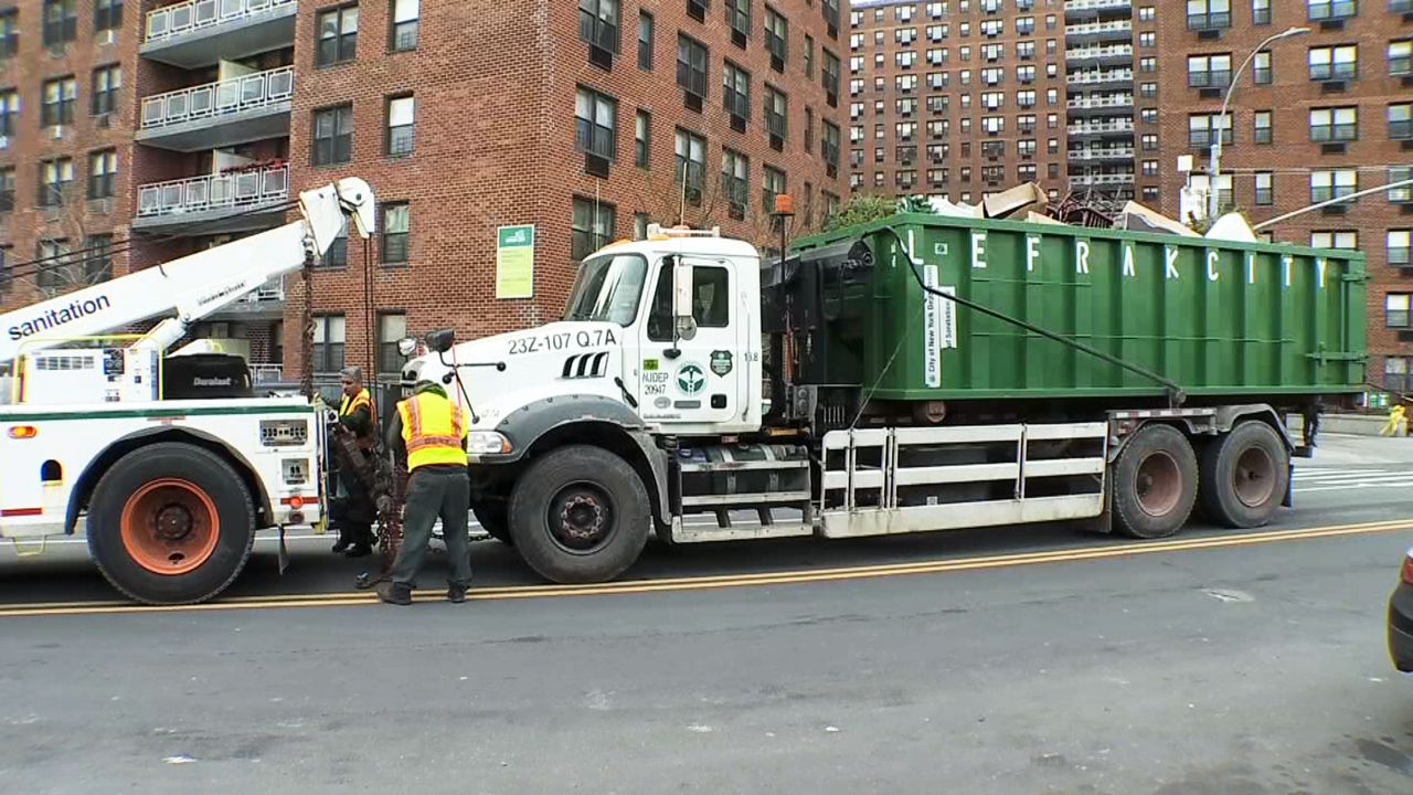 Woman and Boy Struck by NYC Sanitation Truck in Queens
