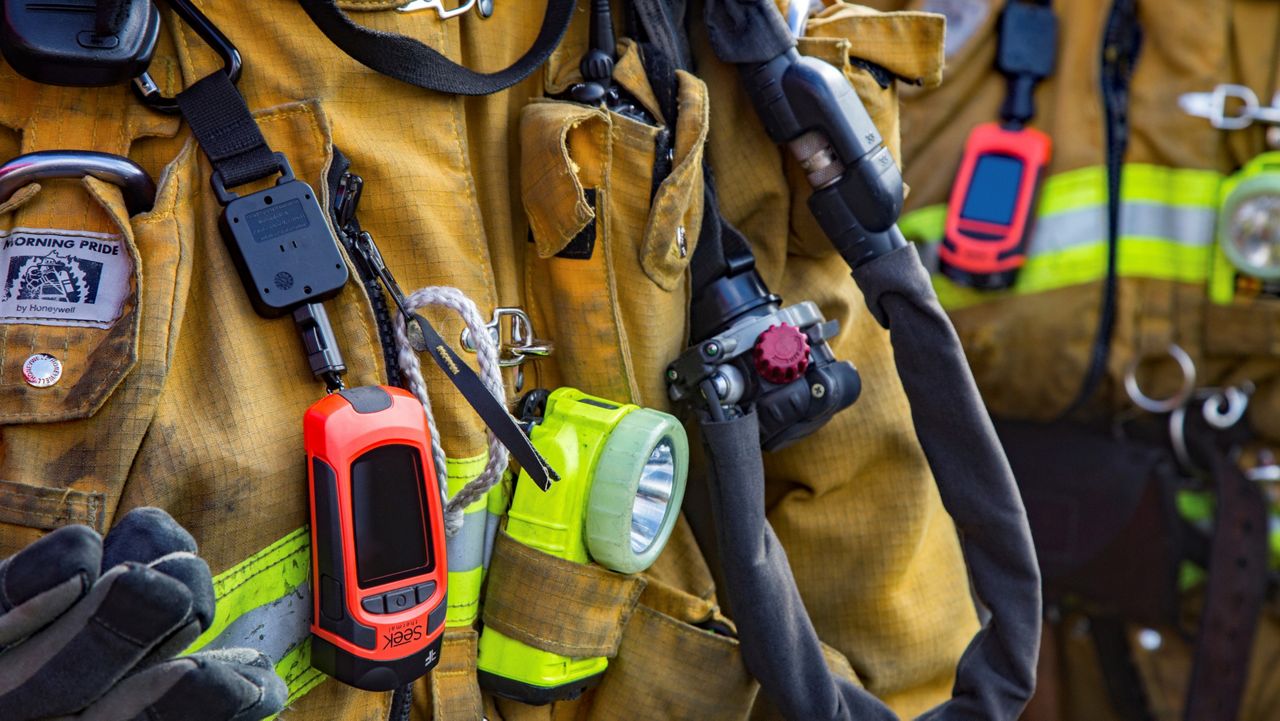 In this file photo from March 22, 2019, Los Angeles Fire Department firefighters are equipped with hand-held thermal imaging cameras. (Los Angeles Fire Department via AP)