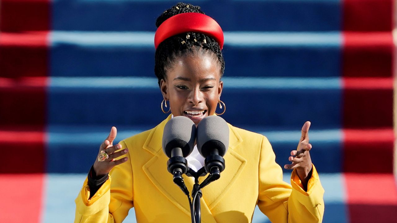 American poet Amanda Gorman reads a poem during the 59th Presidential Inauguration at the U.S. Capitol in Washington, Wednesday, Jan. 20, 2021. (AP Photo/Patrick Semansky, Pool)