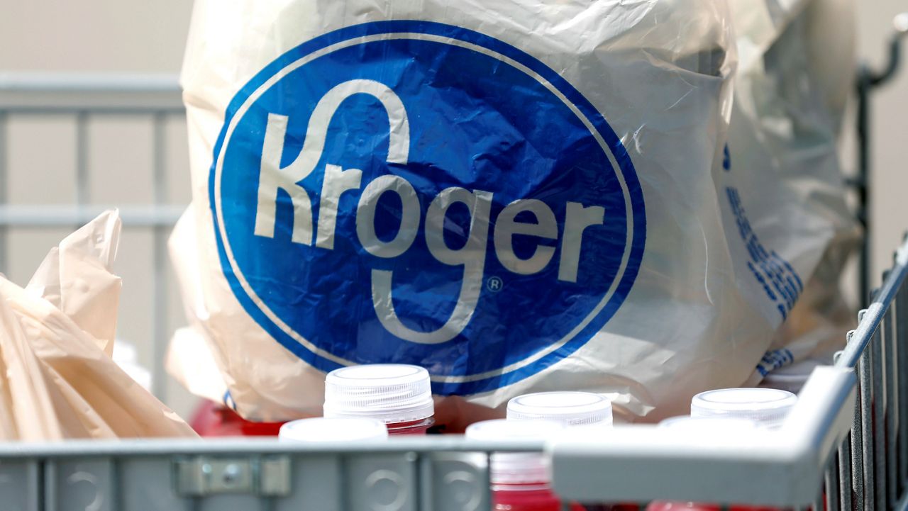 In this June 15, 2017 file photo, bagged purchases from a Kroger grocery store sit in a shopping cart in Flowood, Miss. (AP Photo/Rogelio V. Solis)