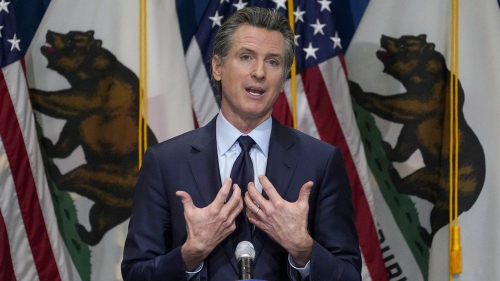 In this Jan. 8, 2021 file photo, California Gov. Gavin Newsom outlines his 2021-2022 state budget proposal during a news conference in Sacramento, Calif. (AP Photo/Rich Pedroncelli, Pool)