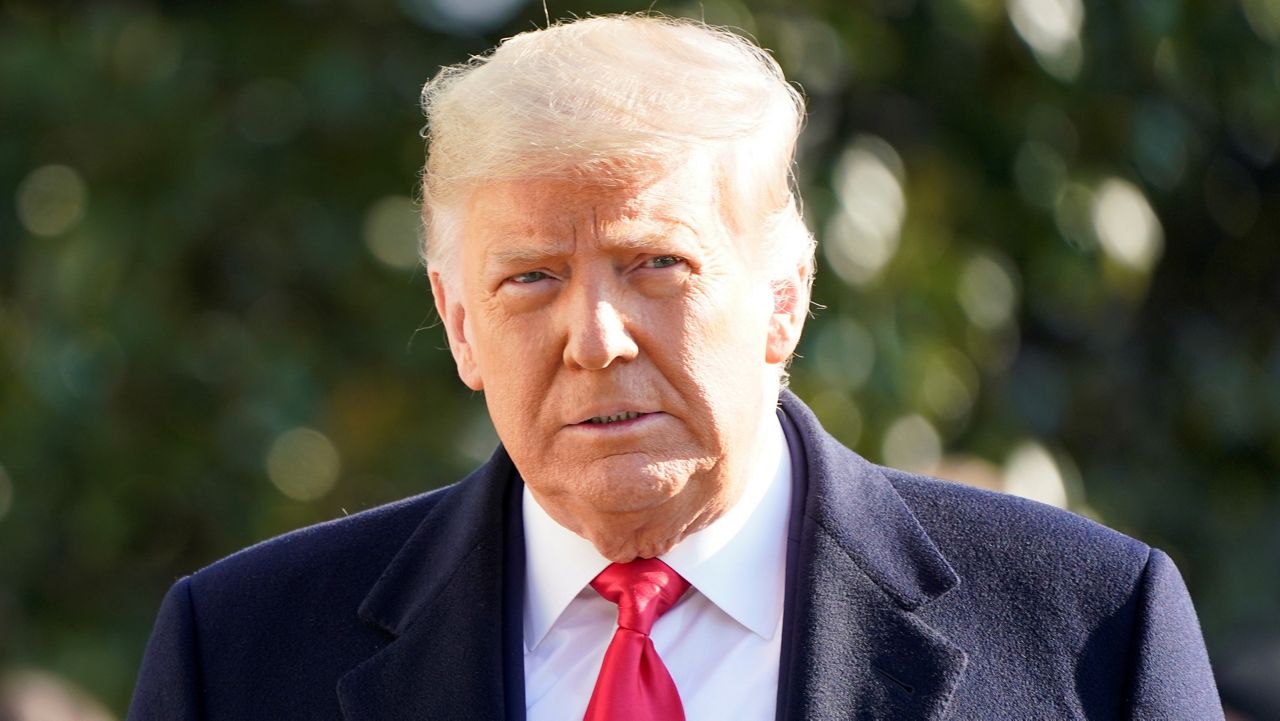  In this combination photo, the SAG-AFTRA logo appears on screen at the 26th annual Screen Actors Guild Awards on Jan. 19, 2020, in Los Angeles and President Donald Trump walks to board Marine One on the South Lawn of the White House on Jan. 12, 2021, in Washington. (AP Photo)