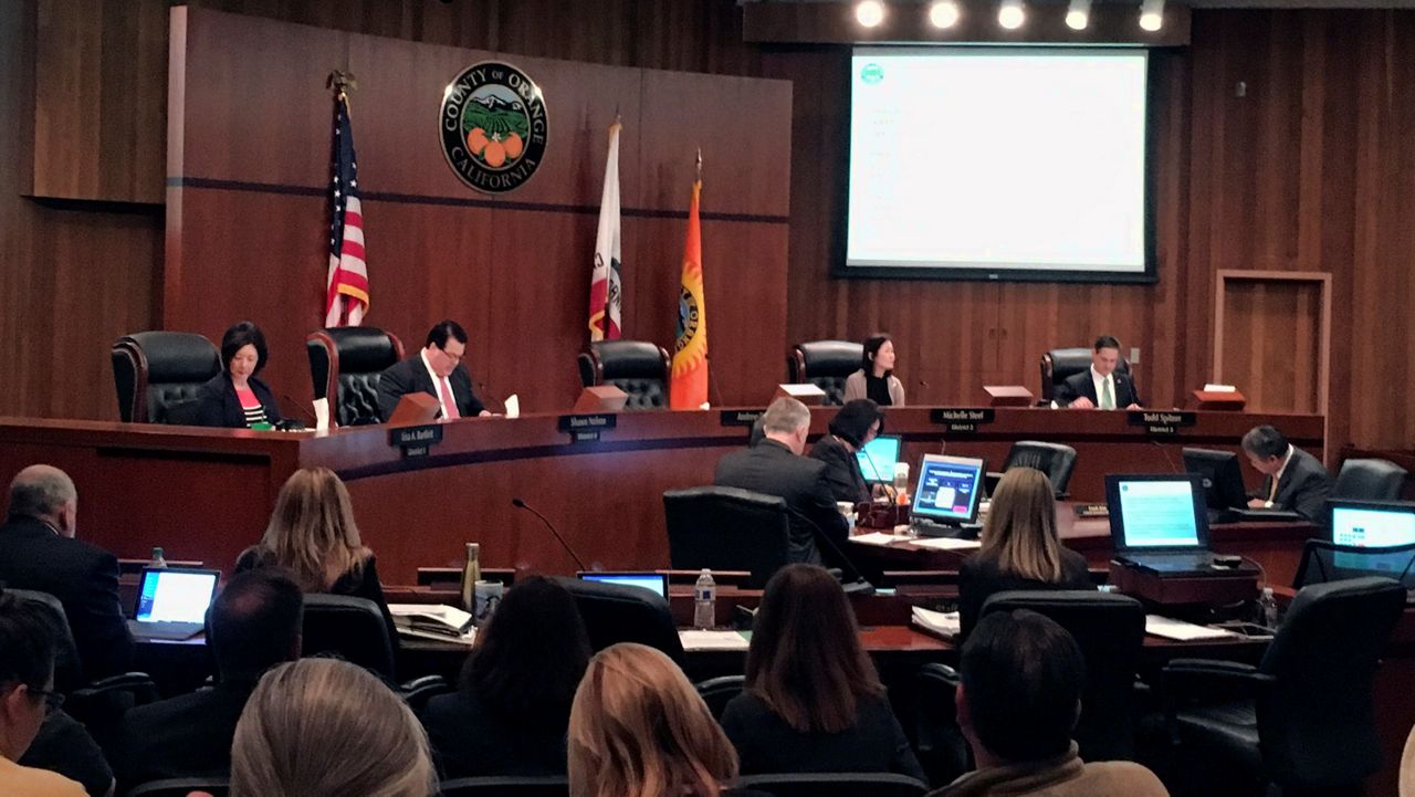 In this file photo from March 27, 2018, the Orange County board of supervisors gather during a meeting in Santa Ana. (AP Photo/Amy Taxin)
