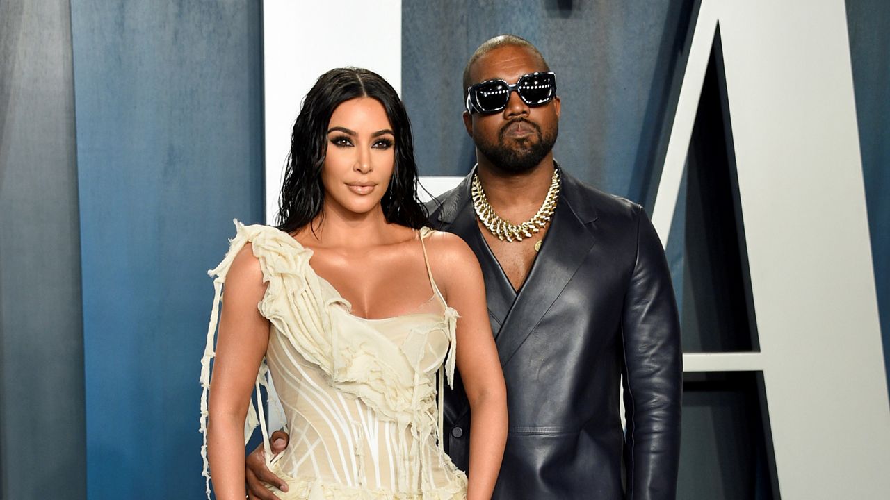 In this February 19, 2020, file photo, Kim Kardashian West, left, and Kanye West arrive at the Vanity Fair Oscar Party in Beverly Hills. Kardashian has filed for divorce. (Photo by Evan Agostini/Invision/AP, File)