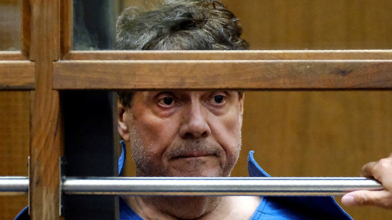 In this July 1, 2019, file photo, Dr. George Tyndall listens during his arraignment at Los Angeles Superior court in Los Angeles. (AP Photo/Richard Vogel, File)