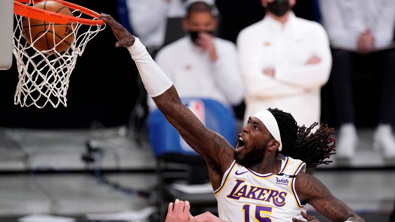 Los Angeles Lakers center Montrezl Harrell dunks during the second half of an NBA basketball game Saturday against the Utah Jazz in Los Angeles. (AP Photo/Mark J. Terrill)