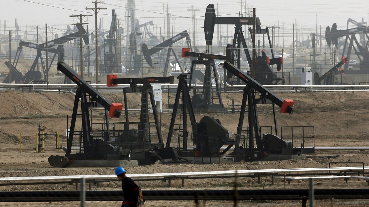 In this Jan. 16, 2015, file photo, pumpjacks are seen operating in Bakersfield. On Friday, California Gov. Gavin Newsom announced he would halt all new fracking permits in the state by January 2024. He also ordered state regulators to plan for halting all oil extraction in the state by 2045. (AP Photo/Jae C. Hong, File)