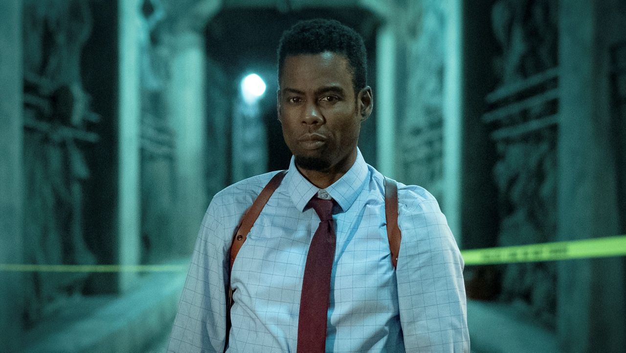 This image released by Lionsgate shows Chris Rock in a scene from "Spiral: From the Book of Saw." (Lionsgate via AP)